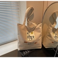 Beige canvas tote bag with artistic moon and sixpence print for daily commuting - Khaki
