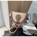 Bohemian cream woven crossbody bag with purple fringe and colorful beadwork - White