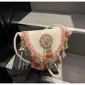 Bohemian hand-woven crossbody bag with colorful tassels and ethnic beadwork - Off White