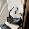 Minimalist black patent leather shoulder bag with glossy pleated finish and long strap - Black