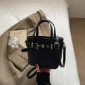 Chic black litchi pattern leather bucket bag with dual handles and crossbody strap - Black