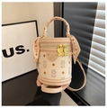 Beige bucket bag with bear patterns, silk scarf handle, and adjustable shoulder strap - Off-white