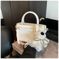 White bucket bag in matte leather with a cute white puppy doll charm and shoulder strap - White with Pendant