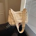 Off-white canvas tote bag with multiple zip pockets and adjustable strap for daily use - Off White