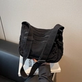 Versatile black canvas tote bag with multiple zipper pockets and wide shoulder strap - Black