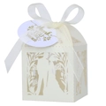 Detail of white hollow-out wedding favor box with ribbon and gold Thank You tag - 5*5cm / Ivory