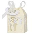 Close-up of laser-cut wedding favor box with heart-shaped couple silhouette and ribbon bow - 5*5cm / Ivory