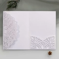 Detailed laser-cut mandala white wedding invitation cover on elegant green gauze background - White