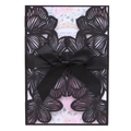 Detail of laser-cut floral wedding invitation with black ribbon and floral inner card - Black Khaki