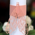 Laser-cut coral pink peacock paper napkin ring with intricate openwork for wedding decor - Pink