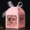 Pink laser cut wedding favor box with Love heart pattern and white organza ribbon - Pink