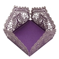 Close-up of laser-cut hollow lace patterns on a deep purple wedding decorative candy box - Dark Purple