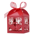 Close-up of red laser-cut swan heart wedding favor box with a translucent organza ribbon - 5*5*8CM / Pearlescent Red