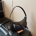 Chic black lychee texture half-moon shoulder bag with silver hardware and zippers - Black