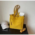 Grand sac fourre-tout jaune vif avec bandoulière réglable et détail de zip tissé - Jaune