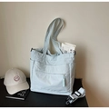 Sac cabas en toile bleu clair avec bandoulière réglable et multiples poches de rangement - Bleu Ciel