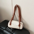 Minimalist barrel shoulder bag in cream canvas with contrast brown leather piping - Brown