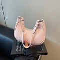 Pink lychee grain leather crescent shoulder bag with silver hardware and adjustable strap - Pink