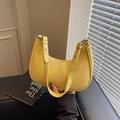 Chic lemon yellow hobo bag with pebble leather texture and adjustable shoulder strap - Yellow
