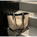 Minimalist beige tote bag with black leather straps and textured suede finish - Gray
