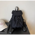 Minimalist black nylon drawstring backpack with flap closure and outdoor buckle detail - Black