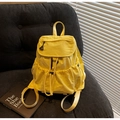 Bright yellow nylon drawstring backpack for women featuring flap cover and side pockets - Yellow