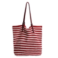 Striped crochet tote bag with red and white patterns and adjustable leather handles - Red