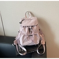 Light purple pleated nylon backpack with drawstring and flap closure in a variant view - Purple