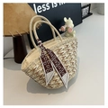 Detailed texture of beige straw tote bag featuring a brown teddy bear pattern silk scarf - Off White