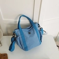Minimalist blue fabric tote bag with top handles and adjustable crossbody strap - Blue