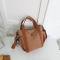 Minimalist tan crossbody bag in nylon with adjustable straps and side drawstring detail - Orange