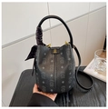 Detail of black lychee grain bucket bag with bear print and decorative silk scarf - Black