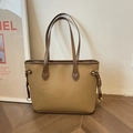 Minimalist light khaki pebble leather tote bag with dark brown straps and gold rings - Brown