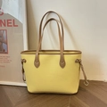 Large yellow tote bag with textured finish and contrasting light brown straps - Yellow