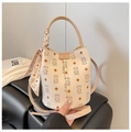 Beige bucket bag with bear patterns, litchi grain faux leather and silk scarf handle - Off-white