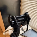 Chic black ruched shoulder bag with bow detail and adjustable strap in soft vegan leather - Black