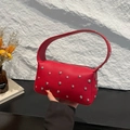 Red lychee texture baguette bag with silver rivets and top handle for women - Red