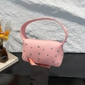 Pink lychee texture leather armpit bag with decorative silver rivets and top handle - Pink