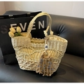 Beige woven straw tote bag with intricate cut-out patterns and Evil Eye tassel charm - Rice White Large