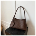 Detailed view of dark brown woven shoulder bag with intricate intrecciato leather pattern - Brown