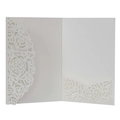 Detail of laser-cut hollow rose pattern on cream pearlescent wedding invitation cover - Ivory