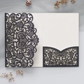 Detail of laser-cut black glitter wedding invitation with elegant hollow floral pattern - Dark Blue