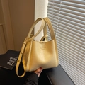 Creamy yellow crocodile pattern bucket bag with adjustable strap and dual handles - Yellow