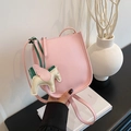 Pink lychee texture crossbody bag with creative Pegasus charm and long strap - Pink