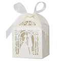 Macro view of white laser-cut wedding favor box with silhouette and satin bow detail - 5*5cm / Ivory