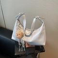 Light blue crescent hobo bag in soft leather with a brown plush bear keychain - With Charm / Gray