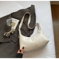 Minimalist white faux leather shoulder bag with adjustable strap on grey blazer - No Pendant / Off White