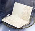 Detailed laser cut mandala patterns on ivory white wedding invitation cards - Ivory