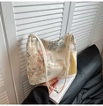 Detailed embroidery of Chinese pavilions and pine trees on an off-white bucket bag - White