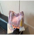 Close-up of lilac satin bucket bag with Chinese embroidery and yellow tassel charm - Purple With Pendant / Purple